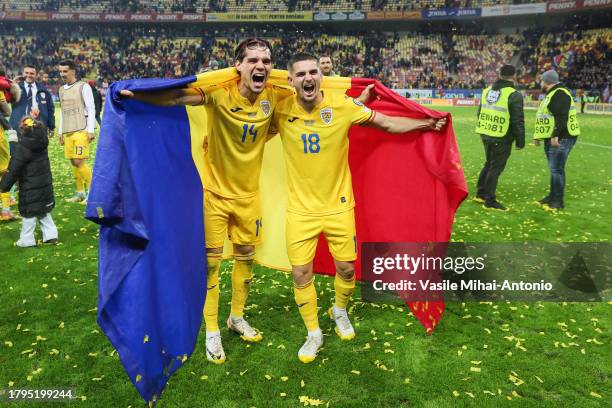 Ianis Hagi of Romania and his teammate Razvan Marin celebrates the qualifying during the UEFA EURO 2024 European qualifier match between Romania and...