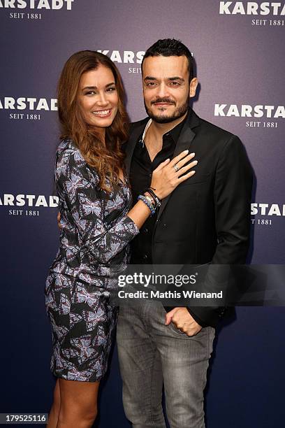 Jana Ina Zarrella and Giovanni Zarrella attend the 'Feel London By Karstadt' Launch Event at Karstadt Store Duesseldorf on September 4, 2013 in...