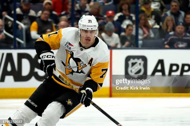 Evgeni Malkin of the Pittsburgh Penguins controls the puck during the game against the Columbus Blue Jackets at Nationwide Arena on November 14, 2023...