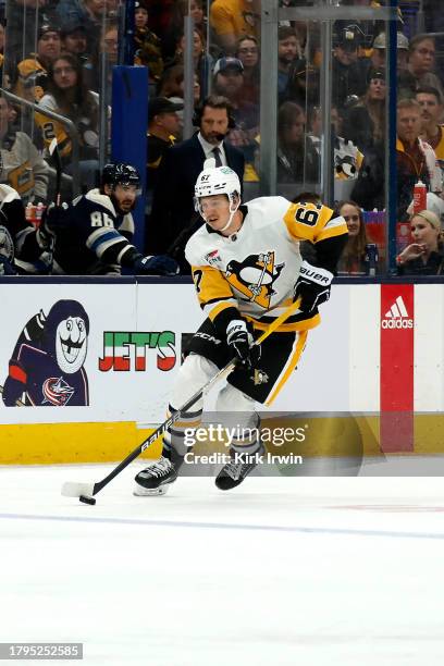 Rickard Rakell of the Pittsburgh Penguins controls the puck during the game against the Columbus Blue Jackets at Nationwide Arena on November 14,...