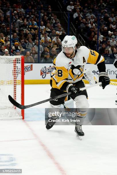 Kris Letang of the Pittsburgh Penguins skates after the puck during the game against the Columbus Blue Jackets at Nationwide Arena on November 14,...