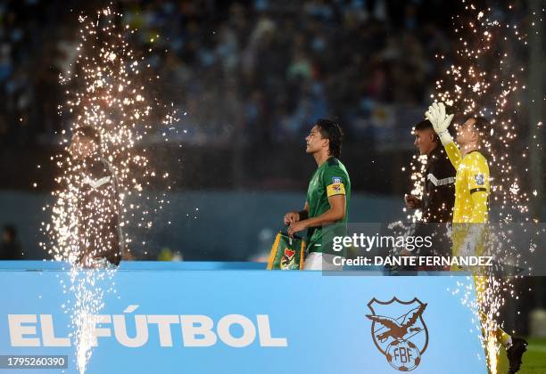 Bolivia's forward Marcelo Martins enters to the field before the 2026 FIFA World Cup South American qualification football match between Uruguay and...