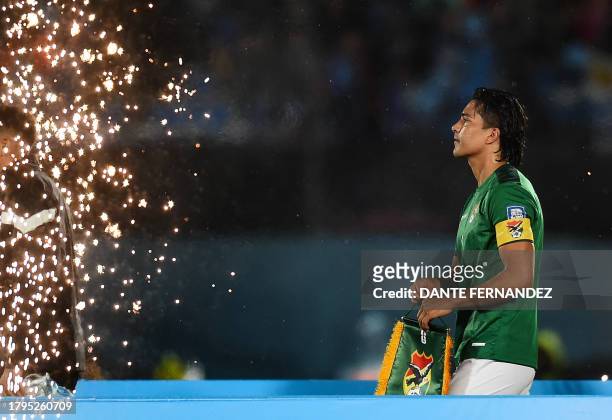 Bolivia's forward Marcelo Martins enters to the field before the 2026 FIFA World Cup South American qualification football match between Uruguay and...