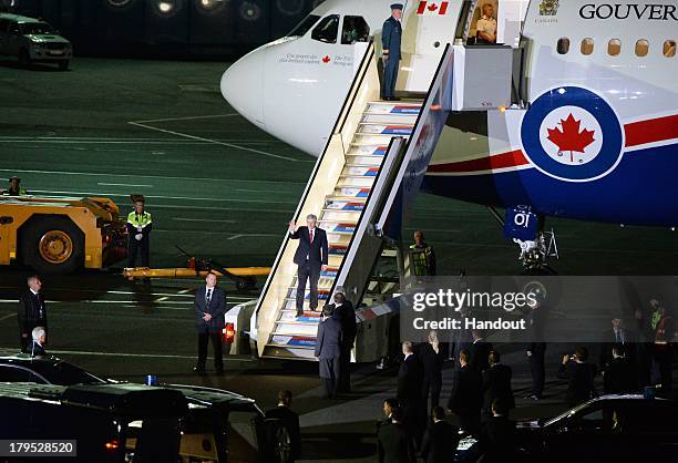In this handout image provided by RIA, Prime Minister of Canada Stephen Harper arrives in St. Petersburg ahead of the G20 summit on September 4, 2013...