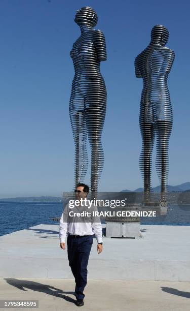 Georgian President Mikheil Saakashvili walks on October 20, 2010 in the Black Sea resort city of Batumi. According to Georgian media reports,...