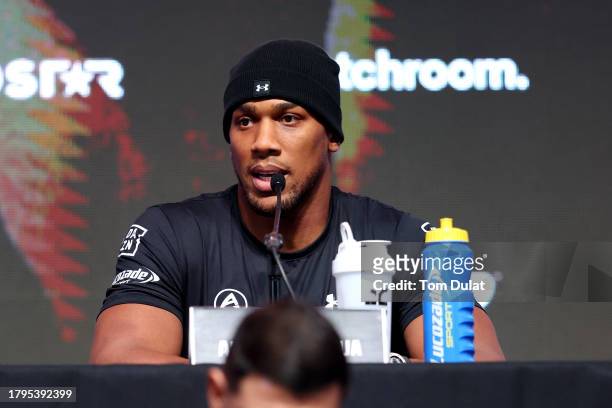 Anthony Joshua of Great Britain speaks during the Day Of Reckoning Press Conference at OVO Arena Wembley on November 15, 2023 in London, England.