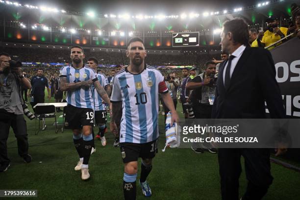 Argentina's forward Lionel Messi and teammates leave the field due to incidents in the stands before the start of the 2026 FIFA World Cup South...