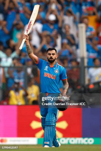 Virat Kohli of India celebrates after scoring a century, overtaking Sachin Tendulkar for the all time most ODI centuries during the ICC Men's Cricket...