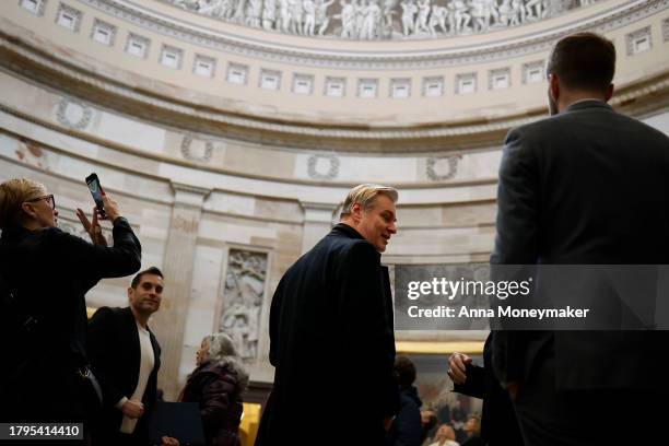 Sen. Kirsten Gillibrand leads film director Christopher Nolan on a tour through the U.S. Capitol Building on November 15, 2023 in Washington, DC.