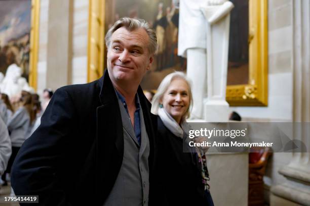 Sen. Kirsten Gillibrand leads film director Christopher Nolan on a tour through the U.S. Capitol Building on November 15, 2023 in Washington, DC.