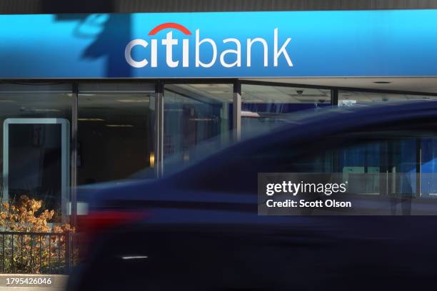 Citibank sign marks the location of one of the bank's branches on November 15, 2023 in Chicago, Illinois. Citigroup, the parent company of Citibank,...