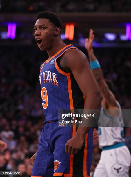 Barrett of the New York Knicks celebrates after he drew the foul during the first half against the Charlotte Hornets at Madison Square Garden on...