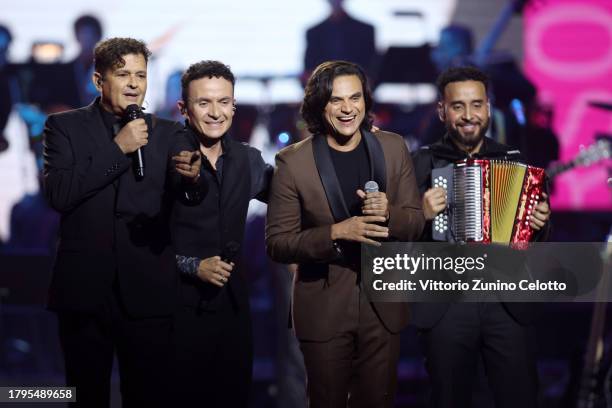 Carlos Vives, Fonseca and Silvestre Dangond perform onstage during the Latin Recording Academy Person of The Year Honoring Laura Pausini at FIBES...