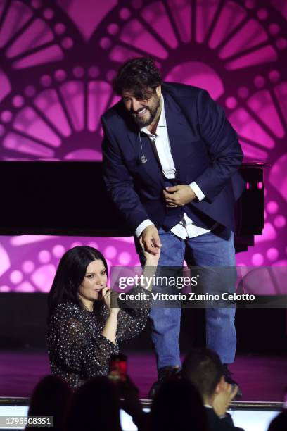 Paula Pausini speaks with Antonio Orozco during the Latin Recording Academy Person of The Year Honoring Laura Pausini at FIBES Conference and...