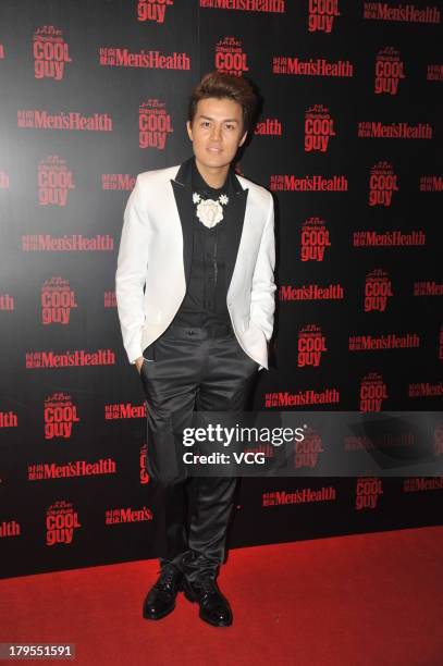 Singer Kenji Wu arrives at the red carpet of the Men's Health Magazine Cool Guy Contest at Kerry Centre Hotel on September 4, 2013 in Beijing, China.