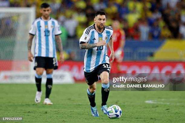 Argentina's forward Lionel Messi controls the ball during the 2026 FIFA World Cup South American qualification football match between Brazil and...