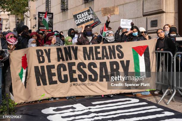 Students participate in a protest in support of Palestine and for free speech outside of the Columbia University campus on November 15, 2023 in New...