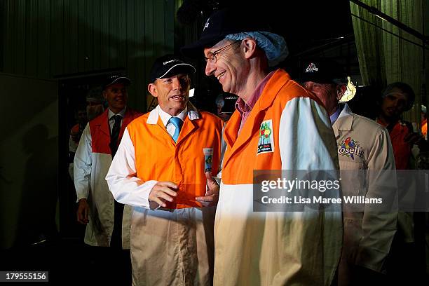 Opposition Leader, Tony Abbott meets staff during a tour of the Rosella Factory on September 5, 2013 in Dandenong, Australia. The Liberal-National...
