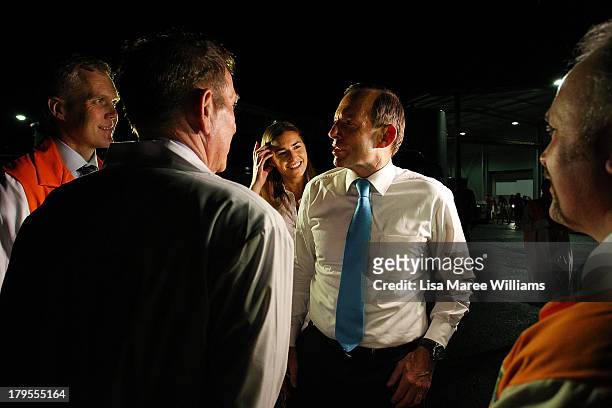 Opposition Leader, Tony Abbott and daughter Francis Abbott take a tour of the Rosella Factory on September 5, 2013 in Dandenong, Australia. The...