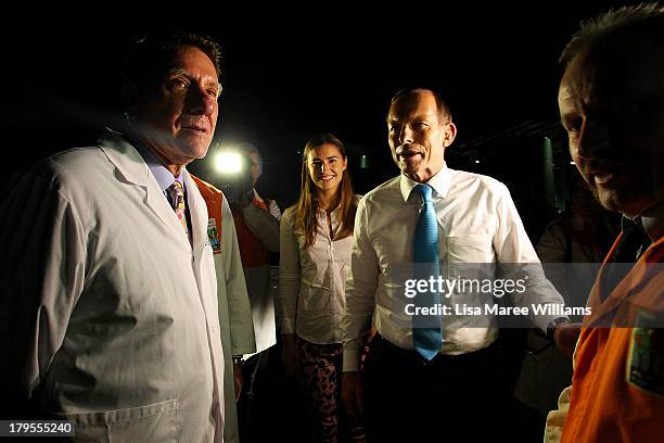 Opposition Leader, Tony Abbott and daughter Frances Abbott take a tour of the Rosella Factory on September 5, 2013 in Dandenong, Australia. The...