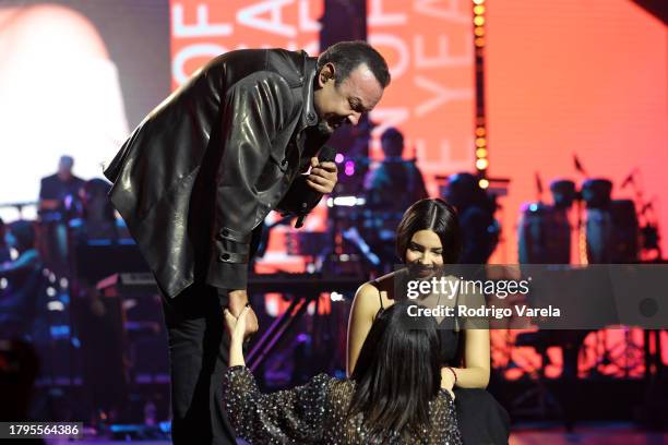 Pepe Aguilar and Ángela Aguilar greet Laura Pausini after their performance during the Latin Recording Academy Person of The Year Honoring Laura...