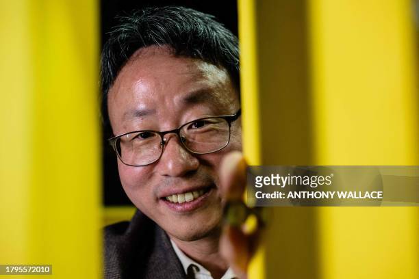 In this photo taken on November 3 Lee Hyuk-rae, director of Netflix documentary "Yellow Door: '90s Lo-fi Film Club" poses during an interview with...