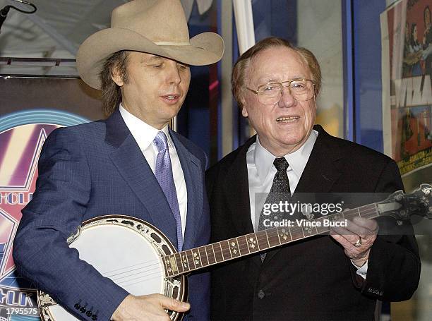 Legendary banjo player Earl Scruggs and actor/musician Dwight Yoakam pose at the ceremony honoring Scruggs with a star on the Hollywood Walk of Fame...