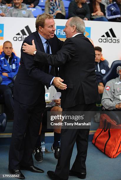 Harry Redknapp, manager of Queens Park Rangers and Lennie Lawrence of Bolton Wanderers shake hands before the Sky Bet Championship match between...