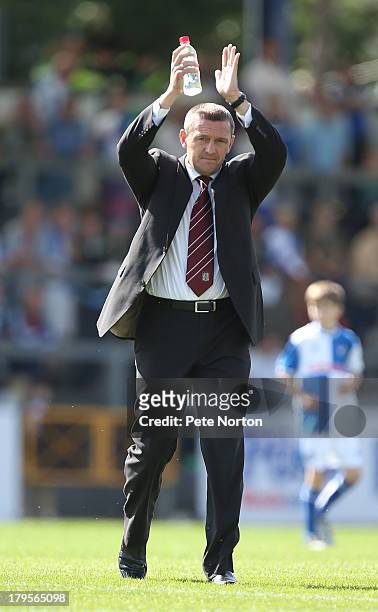 Northampton Town manager Aidy Boothroyd applauds the crowd as he walks to the bench prior to the Sky Bet League Two match between Bristol Rovers and...