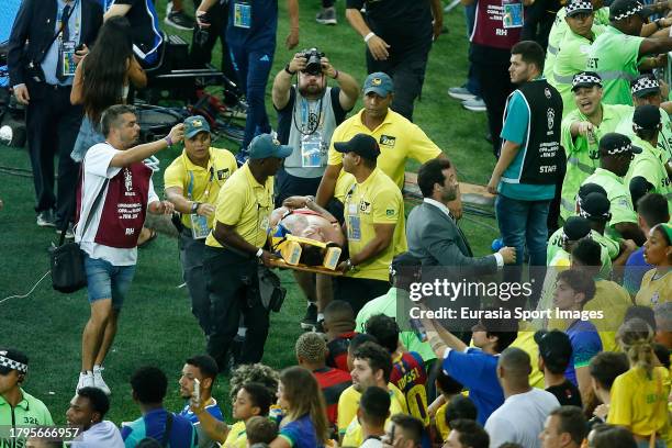 Fan of Argentina is aided by paramedics after clashing with police officers prior FIFA World Cup 2026 Qualifier match between Brazil and Argentina at...