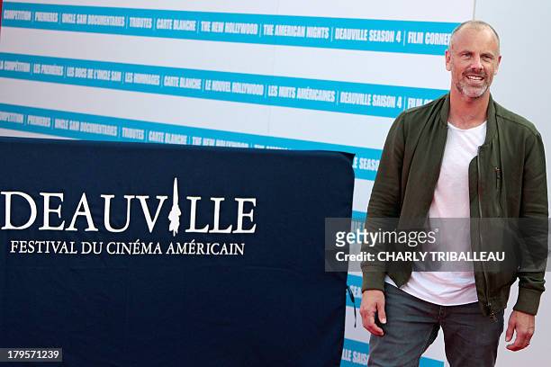 Director Fredrik Bond poses on the red carpet for a photocall before the screening of his film "The Necessary Death of Charlie Countryman" on...