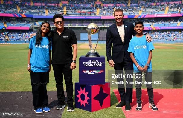 Goodwill Ambassadors, Sachin Tendulkar and David Beckham pose for a photograph with the ICC Men's Cricket World Cup Trophy and UNICEF Mascots prior...
