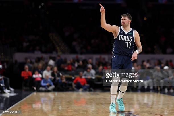 Luka Doncic of the Dallas Mavericks celebrates against the Washington Wizards during the first half at Capital One Arena on November 15, 2023 in...