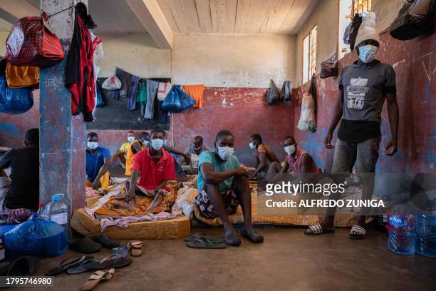 Inmates diagnosed with Tuberculosis gather at an isolated cell in the maximum security prison of Maputo on November 6, 2023. A large pilot of an...