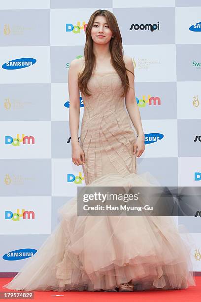 Suzy of South Korean girl group Miss A arrives for photographs at the Seoul International Drama Awards 2013 at National Theater on September 5, 2013...