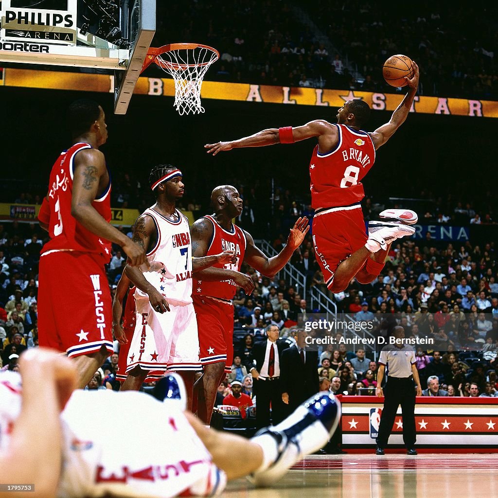 Kobe Bryant of the Western Conference All-Stars goes for a dunk News  Photo - Getty Images