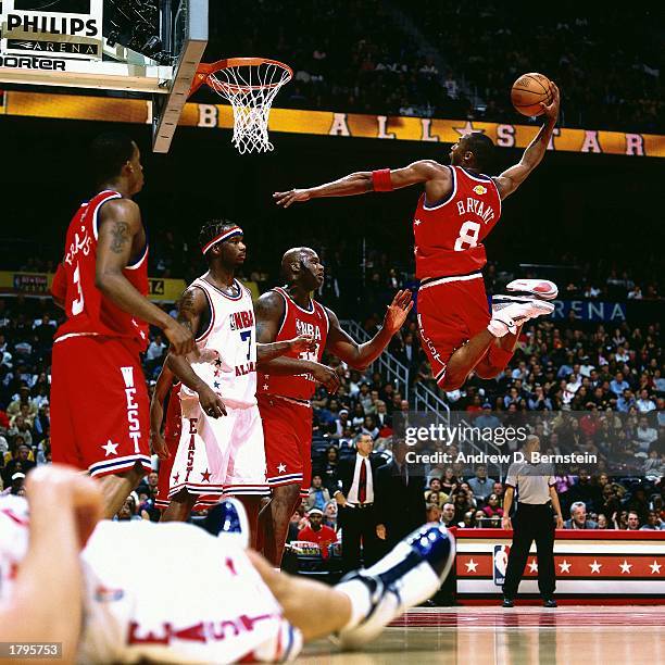 Kobe Bryant of the Western Conference All-Stars goes for a dunk against the Eastern Conference All-Stars during the 2003 NBA All-Star Game at the...