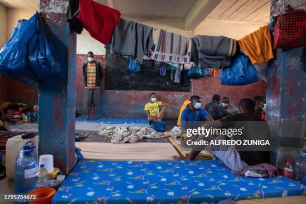 Inmates diagnosed with Tuberculosis gather at an isolated cell in the maximum security prison of Maputo on November 6, 2023. A large pilot of an...