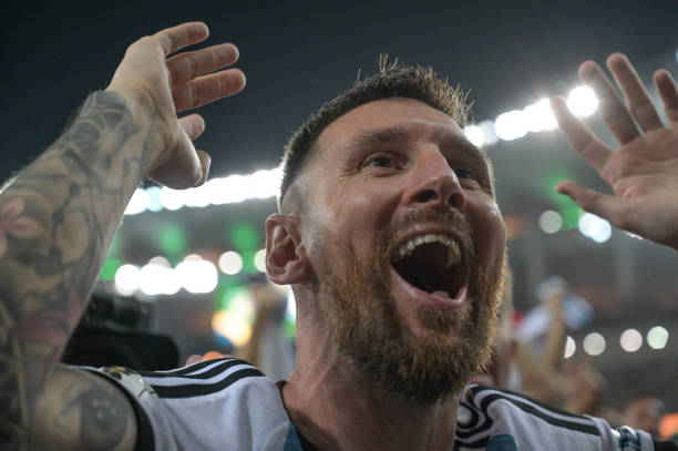 Lionel Messi of Argentina celebrates with his teammates after winning the FIFA World Cup 2026 Qualifier match between Brazil and Argentina at...