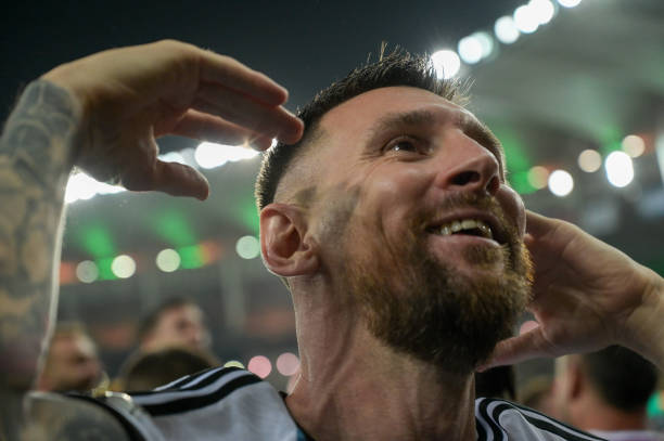 Lionel Messi of Argentina celebrates with his teammates after winning the FIFA World Cup 2026 Qualifier match between Brazil and Argentina at...