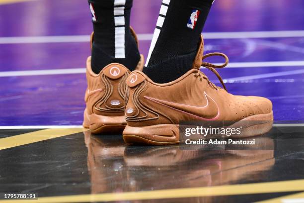 The sneakers worn by LeBron James of the Los Angeles Lakers during the in Season Tournament on November 21, 2023 at Crypto.Com Arena in Los Angeles,...