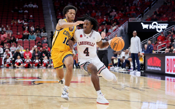 Ty-Laur Johnson of the Louisville Cardinals against the Coppin State Eagles at KFC YUM! Center on November 15, 2023 in Louisville, Kentucky.