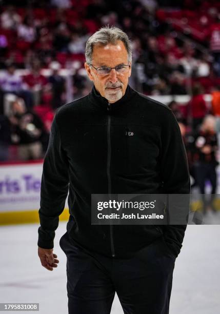 Head coach John Tortorella of the Philadelphia Flyers is seen between periods against the Carolina Hurricanes at PNC Arena on November 15, 2023 in...