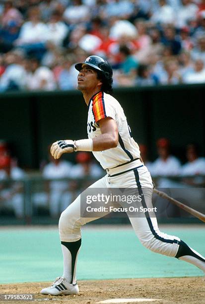 Outfielder Jose Cruz of the Houston Astros bats against the Cincinnati Reds during an Major League Baseball game circa 1980 at Riverfront Stadium in...