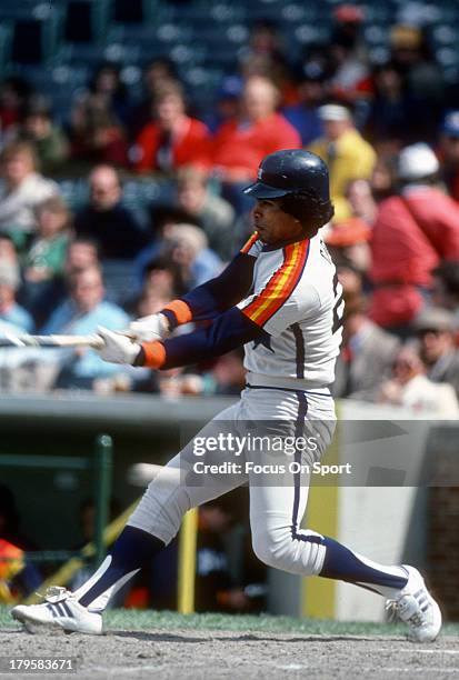 Outfielder Jose Cruz of the Houston Astros bats against the Chicago Cubs during an Major League Baseball game circa 1981 at Wrigley Field in Chicago,...