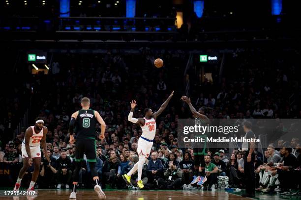 Jrue Holiday of the Boston Celtics shoots the ball against the New York Knicks during the first half at TD Garden on November 13, 2023 in Boston,...