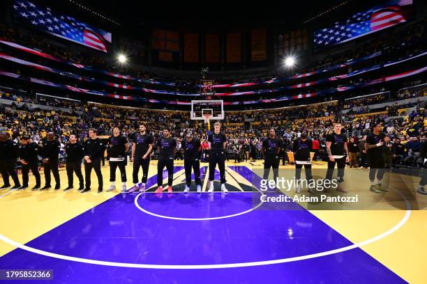 Look at the Utah Jazz team during the National Anthem during the in Season Tournament on November 21, 2023 at Crypto.Com Arena in Los Angeles,...