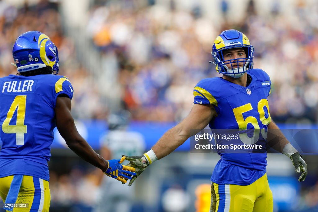 Los Angeles Rams linebacker Troy Reeder celebrates with safety Jordan ...