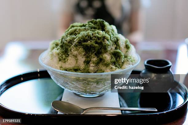 kakigori with green tea syrup - かき氷 ストックフォトと画像