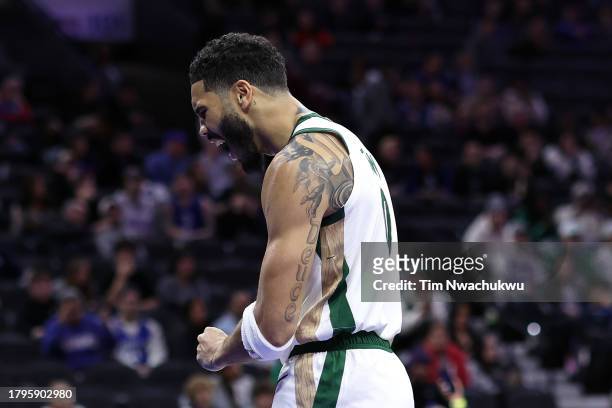 Jayson Tatum of the Boston Celtics reacts during the fourth quarter against the Philadelphia 76ers at the Wells Fargo Center on November 15, 2023 in...